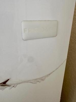 Garage - Freezer - Frigidaire -protective plastic wrap is still in place