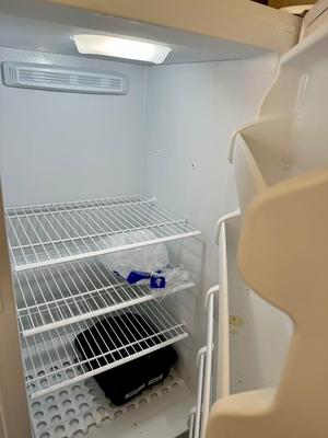 Garage - Freezer - Frigidaire -protective plastic wrap is still in place