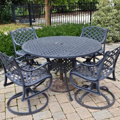 Lot 281: Metal Outdoor Table with Four Swivel Chairs and Umbrella Base