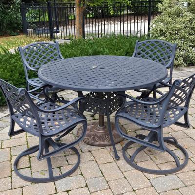 Lot 281: Metal Outdoor Table with Four Swivel Chairs and Umbrella Base