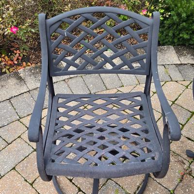 Lot 281: Metal Outdoor Table with Four Swivel Chairs and Umbrella Base