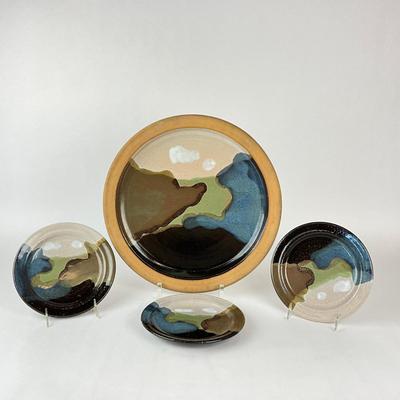 Sale Photo Thumbnail #1425: Three measure: 8.25" diameter glazed plates
One measures: 16" charger
Each in very good condition