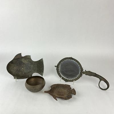 Sale Photo Thumbnail #1457: Fish-shaped dishes, brass bowl, hand mirror
Big fish: 10" long
Small fish: 7.25" long
Hand-mirror: 15.25" long
Brass bowl: 4.5" diameter x 2.5" high