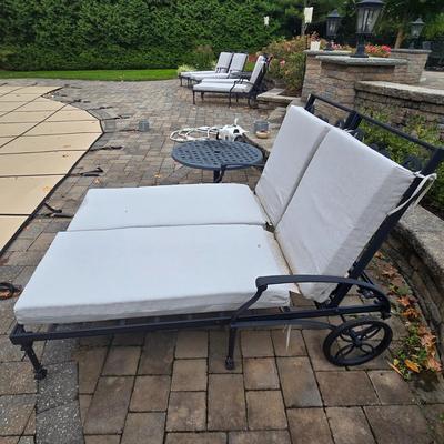 LOT 285: Four Single and One Double Metal Lounge Chairs with Cushions and Two Round Tables