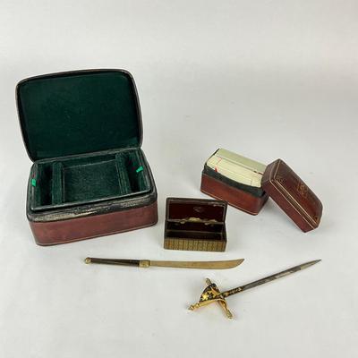 Sale Photo Thumbnail #1481: One comes with Antique playing cards
Large Jewelry Box: 7" wide x 5" deep x 3" high
Small Sword: 8.5" long
Small hand-guard sword: 8" long