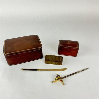 Sale Photo Thumbnail #1482: One comes with Antique playing cards
Large Jewelry Box: 7" wide x 5" deep x 3" high
Small Sword: 8.5" long
Small hand-guard sword: 8" long