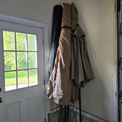 LOT 297G: Four XL Patio Umbrellas with Covers and One Market Umbrella