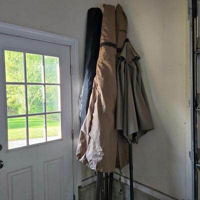 LOT 297G: Four XL Patio Umbrellas with Covers and One Market Umbrella