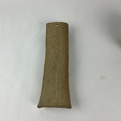 Sale Photo Thumbnail #1488: Abstract textured tube, hand-engraved bull motif
Tube: 11.5" long x 3" wide
Bull: 4.5" high x 4.5" wide