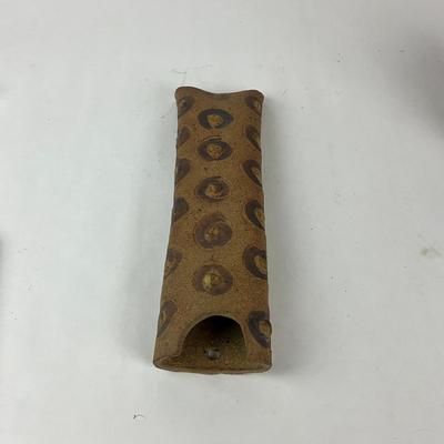 Sale Photo Thumbnail #1487: Abstract textured tube, hand-engraved bull motif
Tube: 11.5" long x 3" wide
Bull: 4.5" high x 4.5" wide