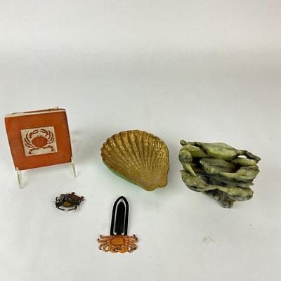 Sale Photo Thumbnail #1489: Brass shell dish, crab tile coaster, crab pin & hair pin, marble crab statue
Shell dish: 5" wide x 6" long
Tile: 3.5" high x 6" wide
Coaster: 4" square