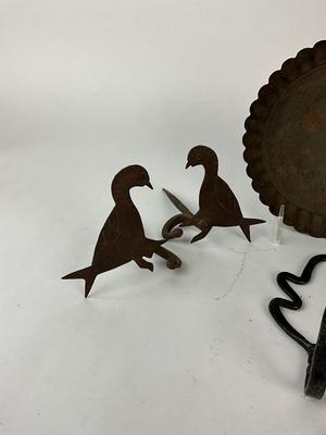 Sale Photo Thumbnail #1513: Bird silhouette hooks, leaf wall hooks, primitive tin plate
Leaf hooks: 6.75" high x 3.25" wide
Bird: 5.5" deep x 4" high
Plate: 7.5" diameter