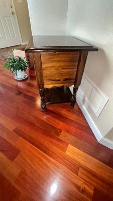 NICE END TABLE WITH CABINET PLUS A LIVE PEACE LILY