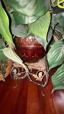 HEAVY WICKER BASKET AND PLANT STAND WITH FAUX PHILODENDRON