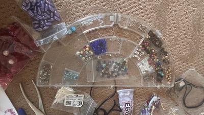 BEADS, AN ENGRAVER AND JEWELRY MAKING TOOLS