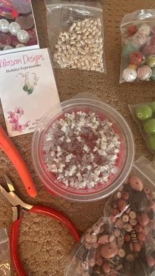 BEADS, AN ENGRAVER AND JEWELRY MAKING TOOLS