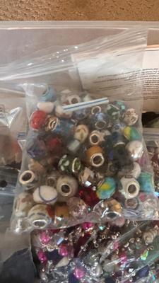 BEADS, AN ENGRAVER AND JEWELRY MAKING TOOLS