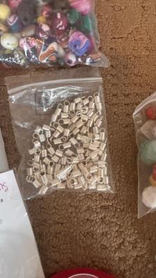 BEADS, AN ENGRAVER AND JEWELRY MAKING TOOLS