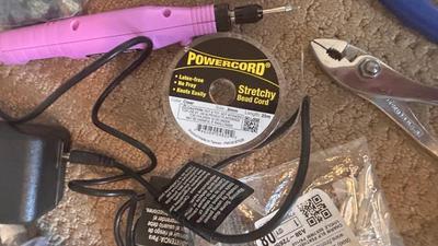 BEADS, AN ENGRAVER AND JEWELRY MAKING TOOLS