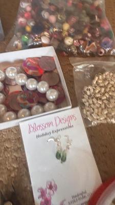 BEADS, AN ENGRAVER AND JEWELRY MAKING TOOLS