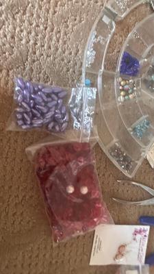 BEADS, AN ENGRAVER AND JEWELRY MAKING TOOLS