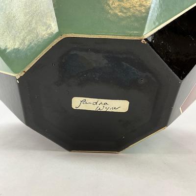 Sale Photo Thumbnail #1571: Glazed Ceramic
Mouth Of vase is 5.5" diameter
Measures: 14.5" high x 18" wide x 18" deep