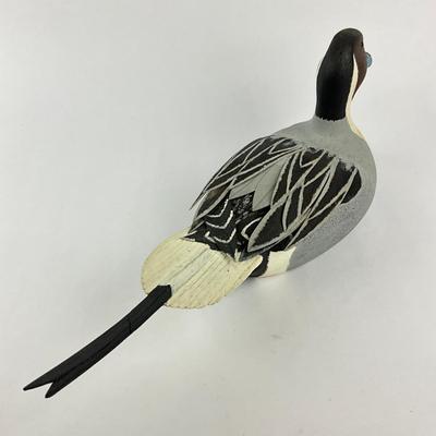 Sale Photo Thumbnail #1596: Tail feather was once broken, has been re-glued
Carving company: Colonel's Carvings
Measures: 7" high x 20" long x 5.25" wide