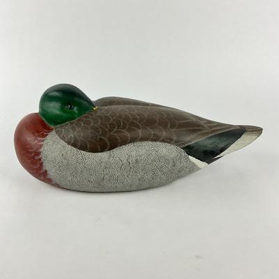 Sale Photo Thumbnail #1608: Local Chesapeake Carver, has one spot where wood was dented, refer to photos
Measures: 5.25" high x 14" long x 6.25" wide