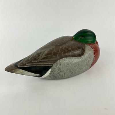 Sale Photo Thumbnail #1604: Local Chesapeake Carver, has one spot where wood was dented, refer to photos
Measures: 5.25" high x 14" long x 6.25" wide