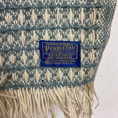 Sale Photo Thumbnail #1714: One is a cream colored blanket, made in USA. one is a Pendleton blanket, Made By Pendleton Hill (Has few stain spots and one hole)
Pendleton blanket: 61" wide x 49" high
Cream blanket: 77" wide x 72" high