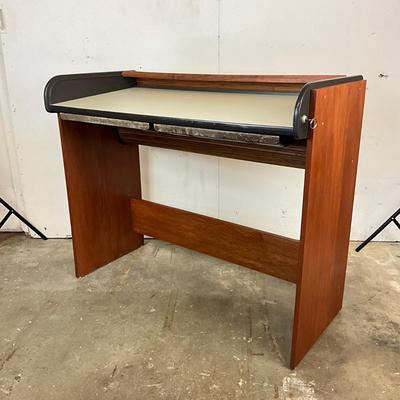Sale Photo Thumbnail #1738: Drawers are sun faded, break/crack on accordion top, refer to photos
Roll top desk: 50" wide x 25" deep x 41" high