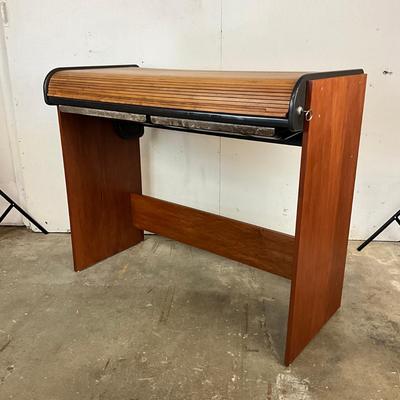 Sale Photo Thumbnail #1739: Drawers are sun faded, break/crack on accordion top, refer to photos
Roll top desk: 50" wide x 25" deep x 41" high