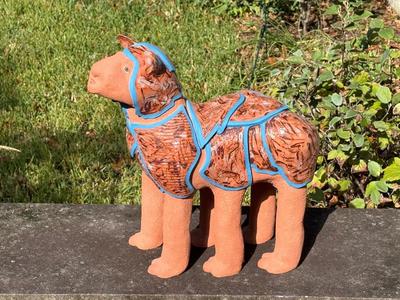 Sale Photo Thumbnail #1884: clay sculpture of six legged animal - can be used inside or garden