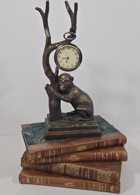 LOT 34Z: Monkey Clock and Four Antique Books
