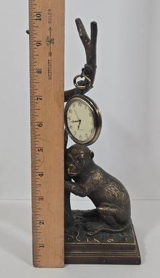 LOT 34Z: Monkey Clock and Four Antique Books
