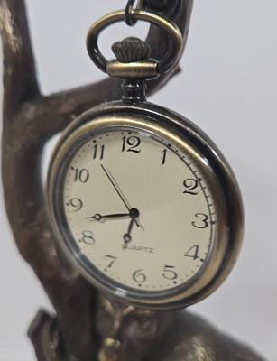 LOT 34Z: Monkey Clock and Four Antique Books