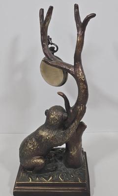 LOT 34Z: Monkey Clock and Four Antique Books