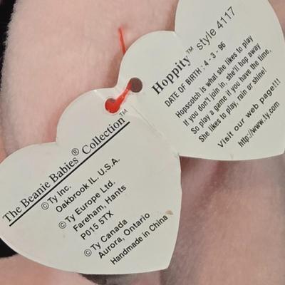 LOT 82X: Bunny Nursery Decor Including Framed Print, TY Beanie Babies Hoppity, Artist Original Music Box, and More