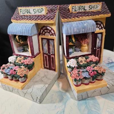 LOT 86X: Three Flowered Hat Boxes, Glass Paper Weight, Flower Pens, and More