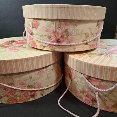 LOT 86X: Three Flowered Hat Boxes, Glass Paper Weight, Flower Pens, and More