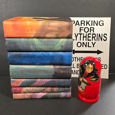 LOT 90X: Harry Potter Books, Nesting Dolls, and Sign
