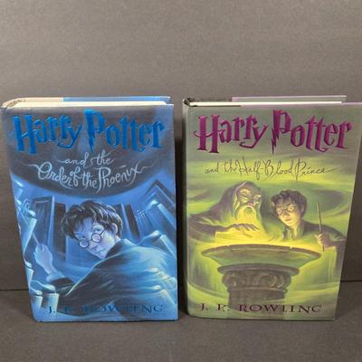 LOT 90X: Harry Potter Books, Nesting Dolls, and Sign