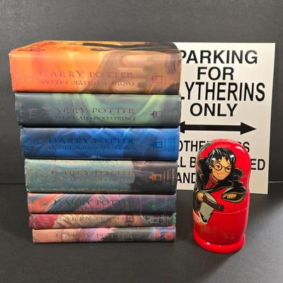 LOT 90X: Harry Potter Books, Nesting Dolls, and Sign