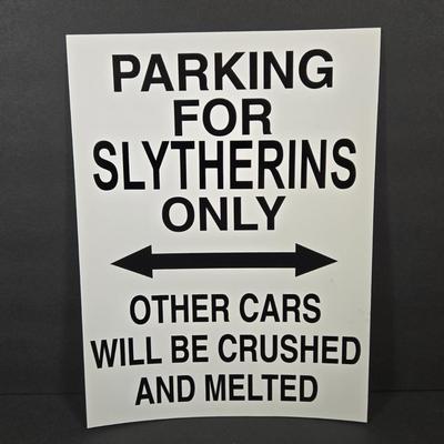 LOT 90X: Harry Potter Books, Nesting Dolls, and Sign