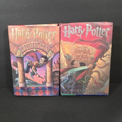 LOT 90X: Harry Potter Books, Nesting Dolls, and Sign