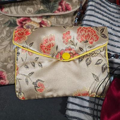 LOT 97X: Multiple Hand Bags, Coin Purses, and More