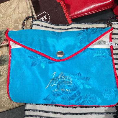LOT 97X: Multiple Hand Bags, Coin Purses, and More