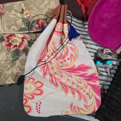 LOT 97X: Multiple Hand Bags, Coin Purses, and More