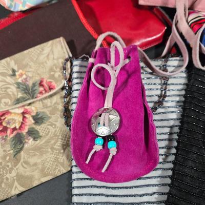 LOT 97X: Multiple Hand Bags, Coin Purses, and More