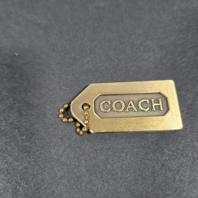 LOT 97X: Multiple Hand Bags, Coin Purses, and More